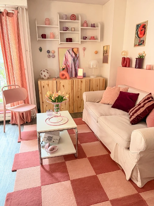 Pastel Pink Checked Rug with Raw Wood Cabinetry
