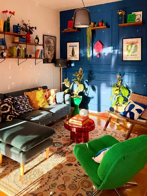 Deep Blue Paneled Accent Wall with Eclectic Seating