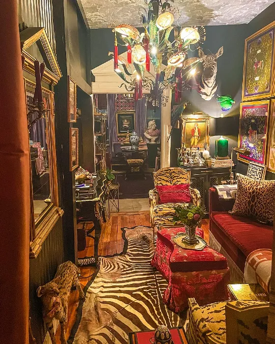 Moody Dark Parlor with Zebra Pattern Accents