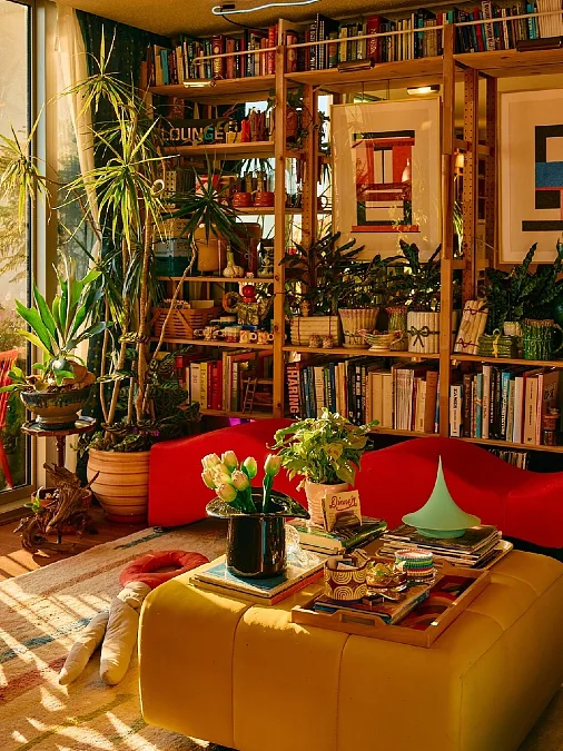 Yellow Curved Floor Lamp and Molded Plastic Coffee Table