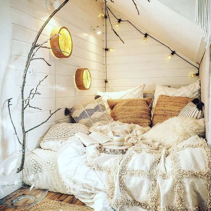 Boho Loft Nook with Fairy Lights and Textured Neutral Layers