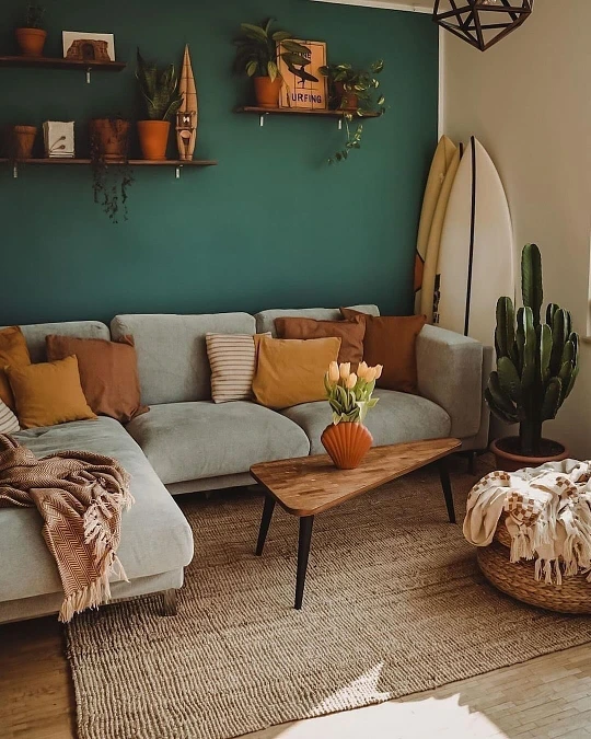 Deep Teal Accent Wall with Earth Tone Textiles