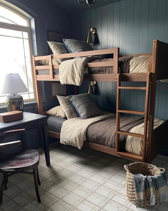 Walnut Bunk Bed Against Deep Blue Paneled Walls