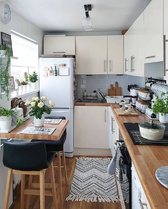 Window Side Breakfast Nook with Warm Wood Countertops