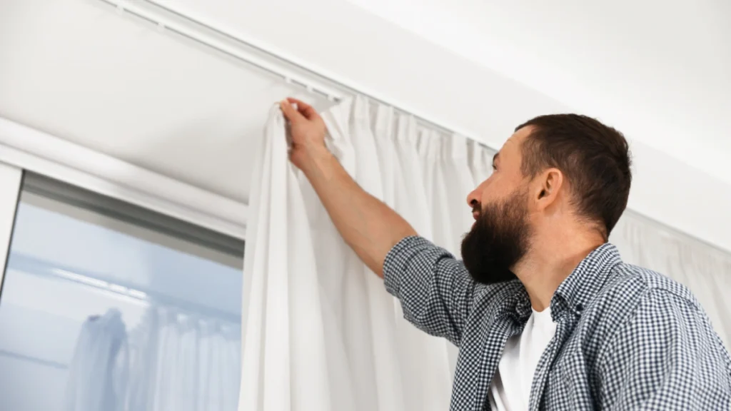 Hang Curtains Higher and Wider