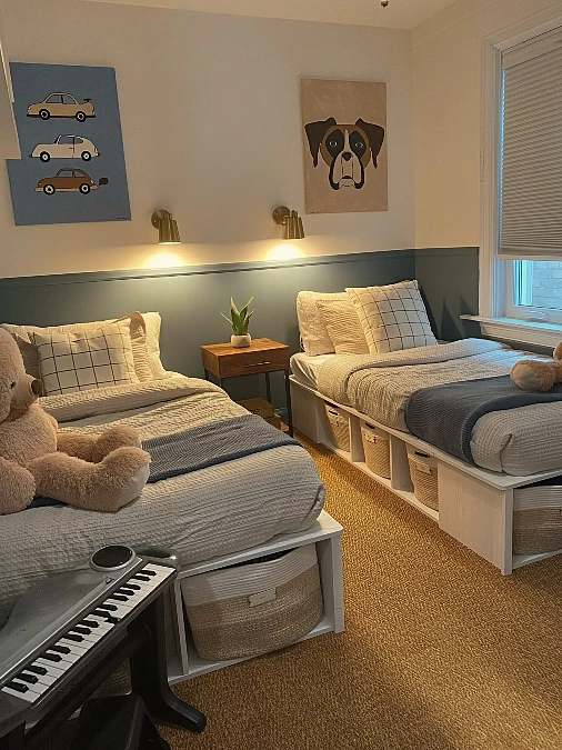 Balanced Twin Beds With Built In Storage and Soft Blue Wall