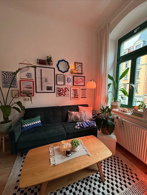 Amber Floor Lamp Beside a Gallery Wall Sofa