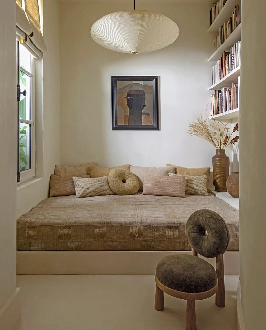 Neutral Daybed Nook With Wall Shelves