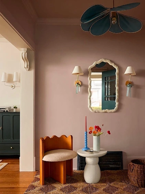 Mauve Living Zone with Wavy White Mirror and Blue Petal Pendant