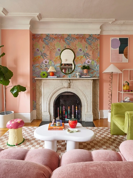 Coral Pink Living Room with Floral Fireplace Wallpaper Accent