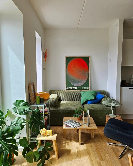 Olive Green Sofa with Oversized Art Print Accent