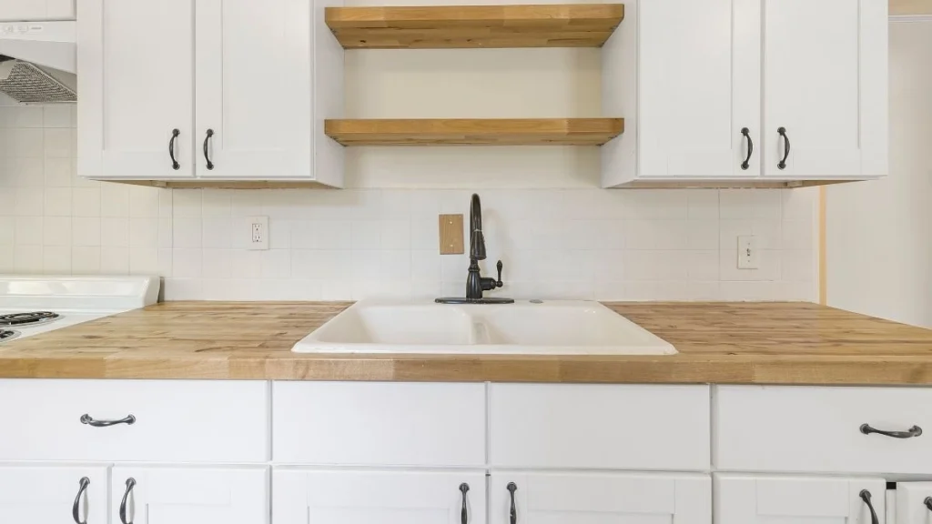 Utilize Two Tone Cabinetry for Visual Depth