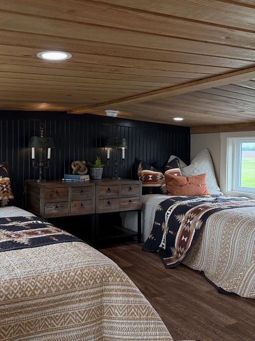 Twin Beds with Black Beadboard