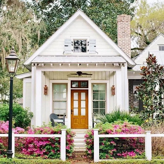 White Cottage with Garden Borders