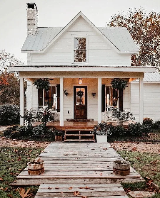 White Farmhouse Porch and Garden