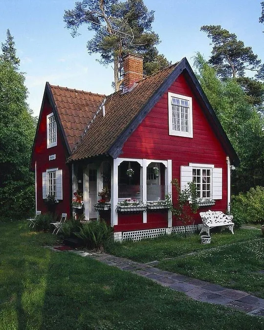 Red Farmhouse Cottage with White Trim