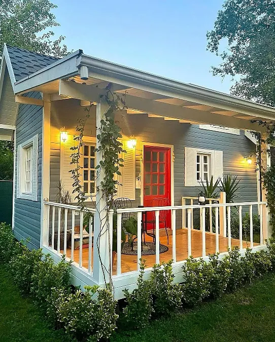 Blue Cottage with a Red Front Door
