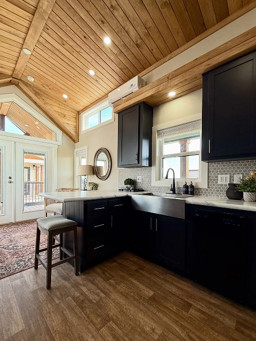 Black Kitchen with Wood Ceiling