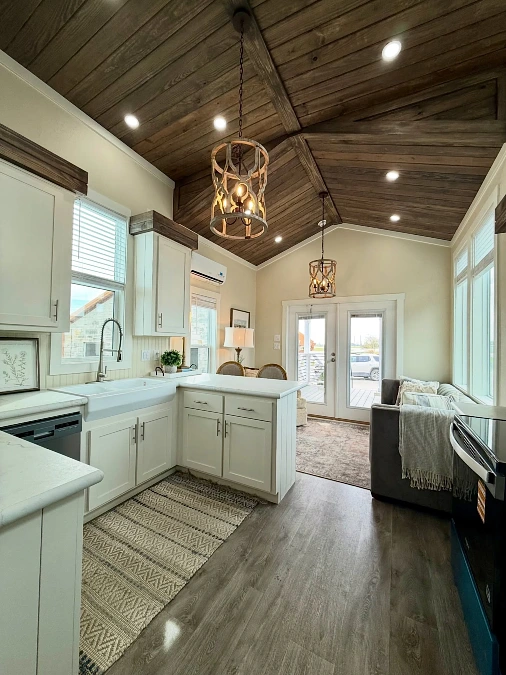 White Farmhouse Kitchen with Vaulted Ceiling