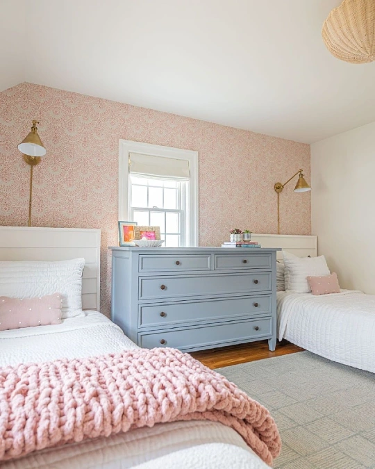 Symmetrical Twin Beds with a Shared Dresser